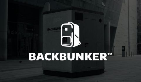 Backbunker logo over a darkened image of a concrete bunker